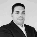Black and white photo profile photo of Frank Sgueglia, Vice President of IT at Penta Group